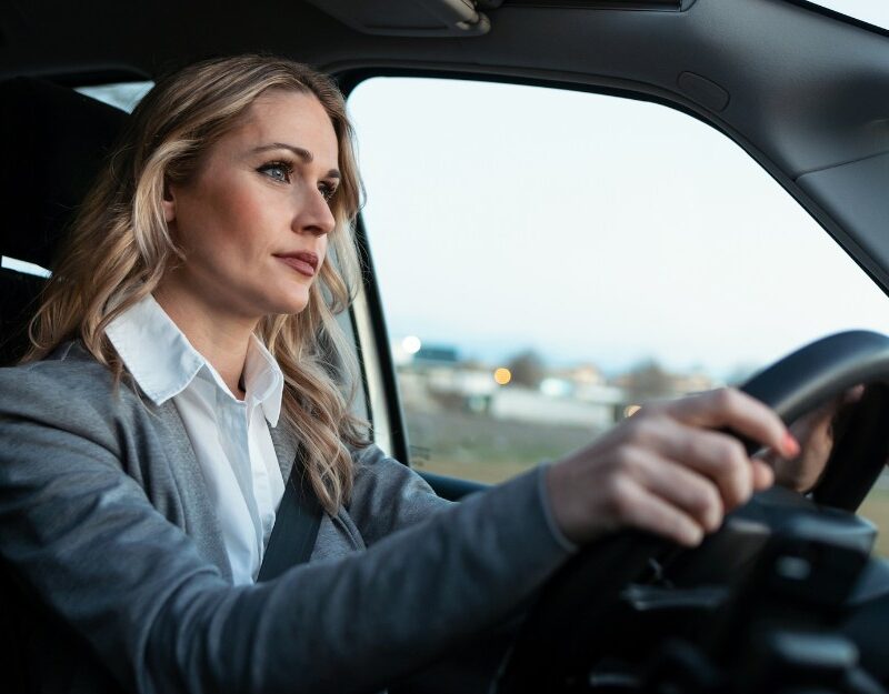 Woman driving car on her way to work, aware of CTP insurance claims for compensation in Queensland